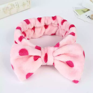 Soft pink bow tie headband. pink and purple polka dot fleece hair band.